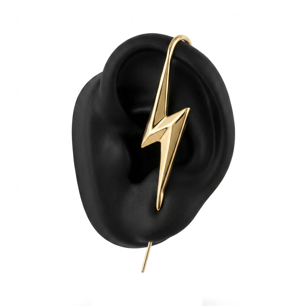 Lightning Bolt ear cuff in gold on a black ear form