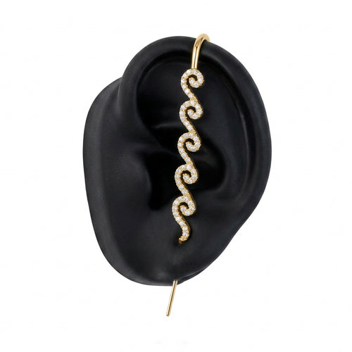 Ocean Waves ear cuff in gold on a black ear form