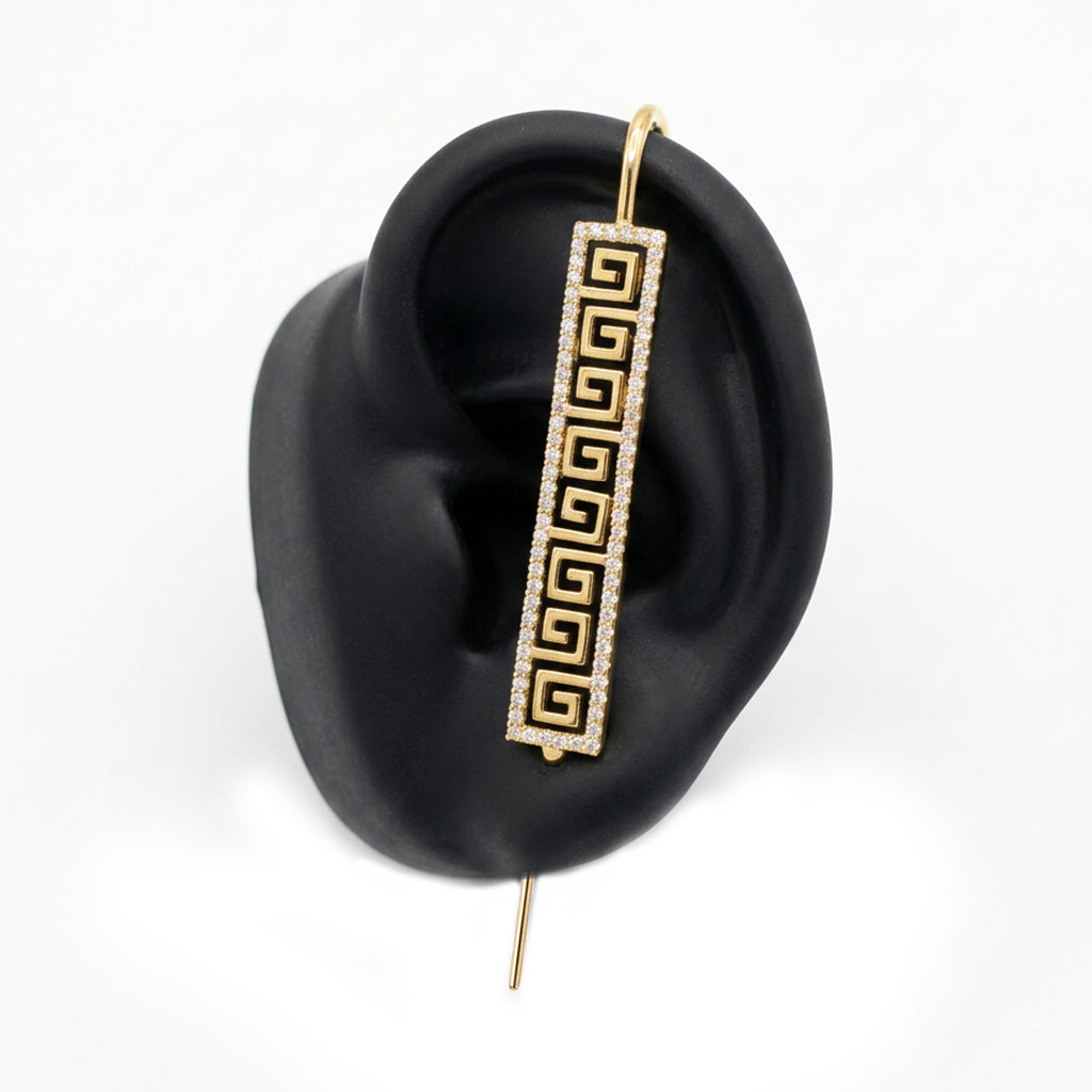 Tribal ear cuff in gold on a black ear form