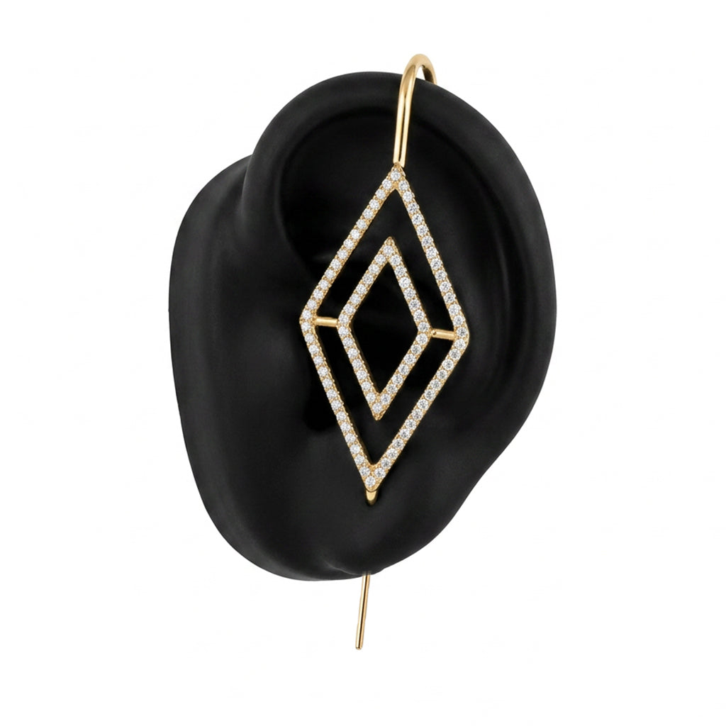 Diamond ear cuff in gold on a black ear form
