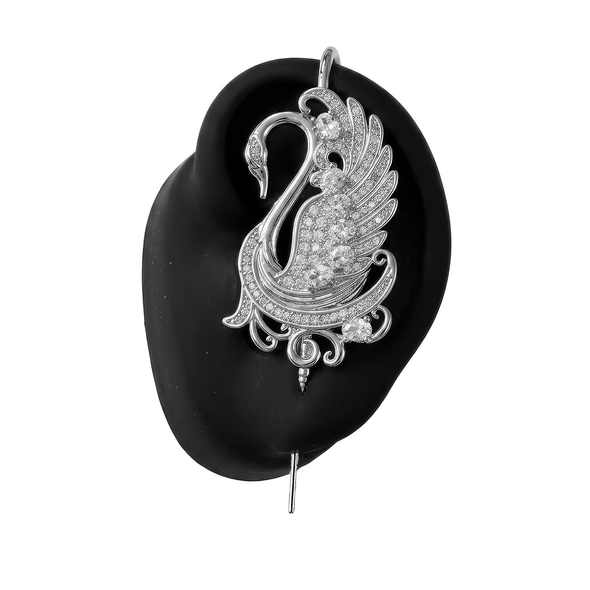 Graceful Swan ear cuff in silver on a black ear form