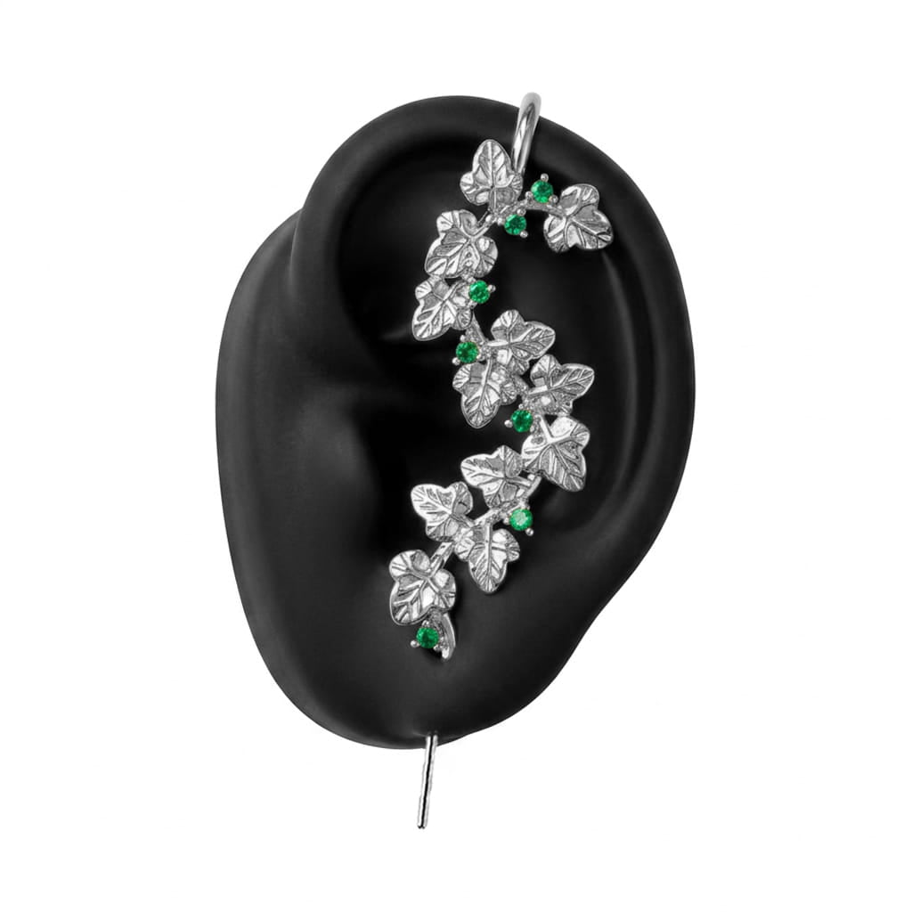 Creeping Ivy ear cuff in silver on a black ear form