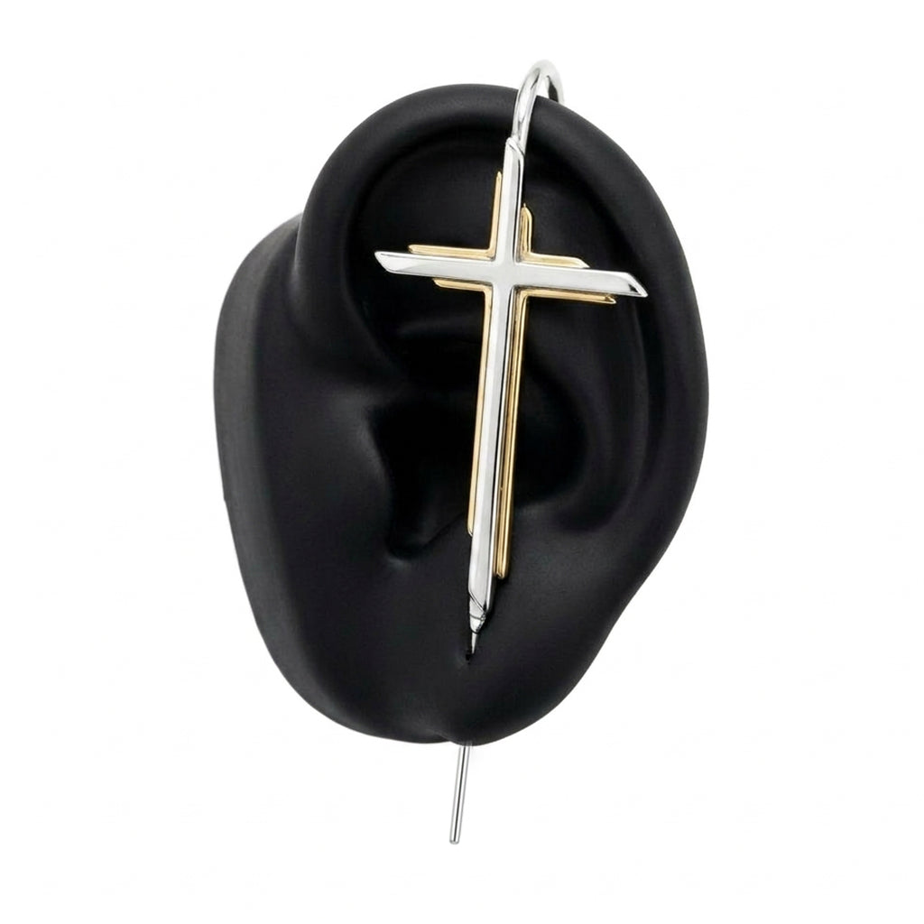 Cross ear cuff in silver on a black ear form