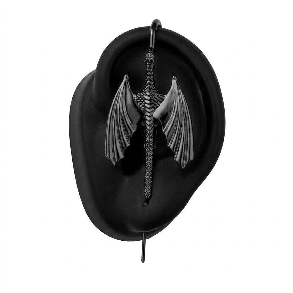Stormscale ear cuff in black on a black ear form