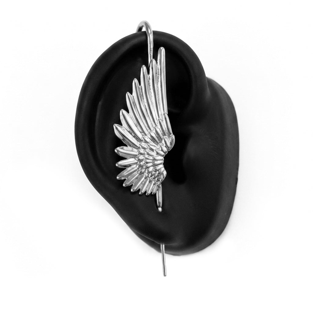 Celestial Wing ear cuff in silver on a black ear form