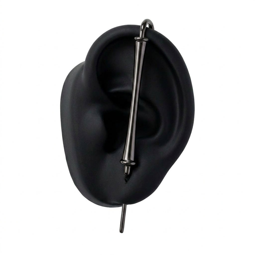 Pillar of Fortitude ear cuff in black on a black ear form
