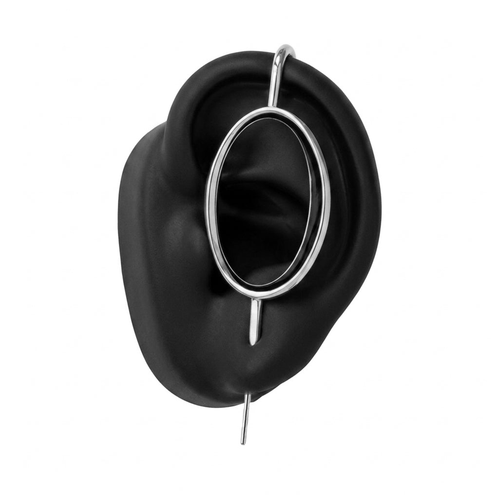 Halo ear cuff in silver on a black ear form