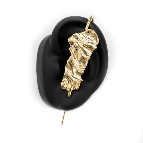 Sculpted Cascade ear cuff in gold on a black ear form