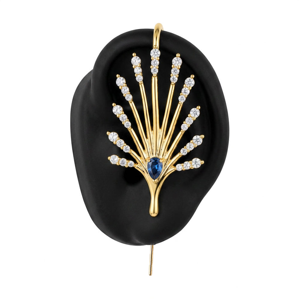 Ethereal Fountain ear cuff in gold on a black ear form