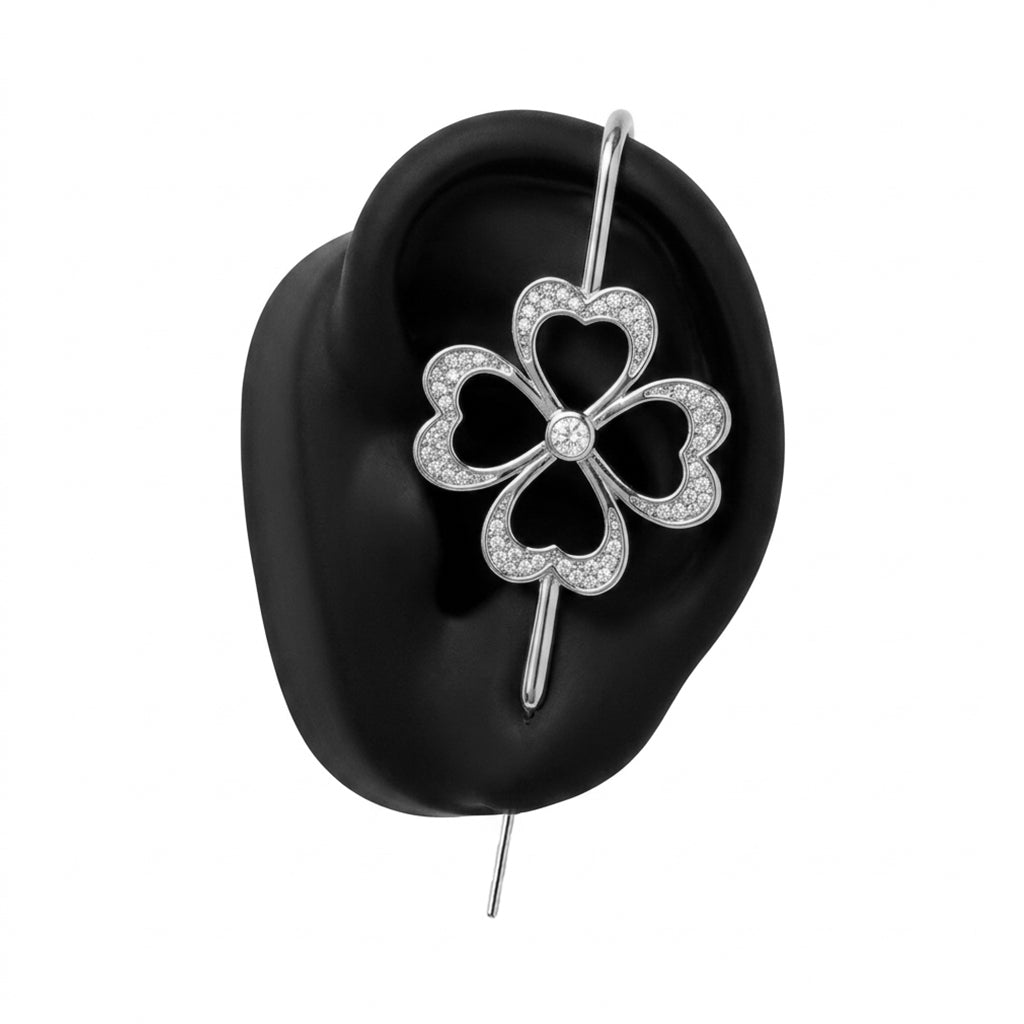 Lucky Clover ear cuff in silver on a black ear form
