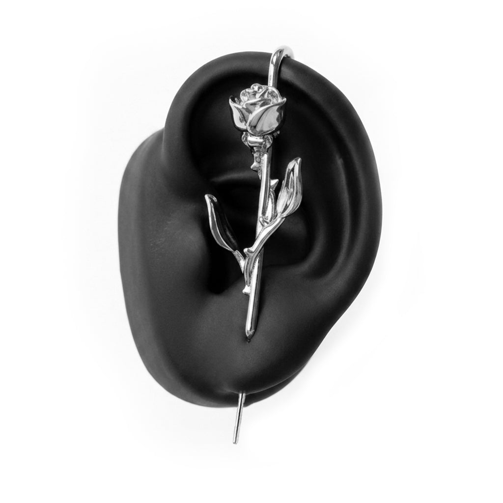Radiant Rose ear cuff in silver on a black ear form