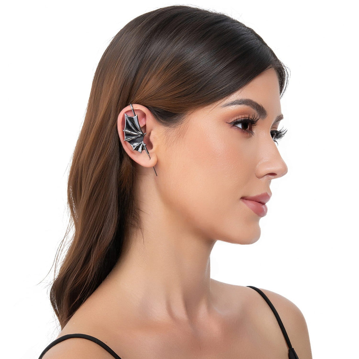 Nightfall Wings ear cuff in black on a black ear form