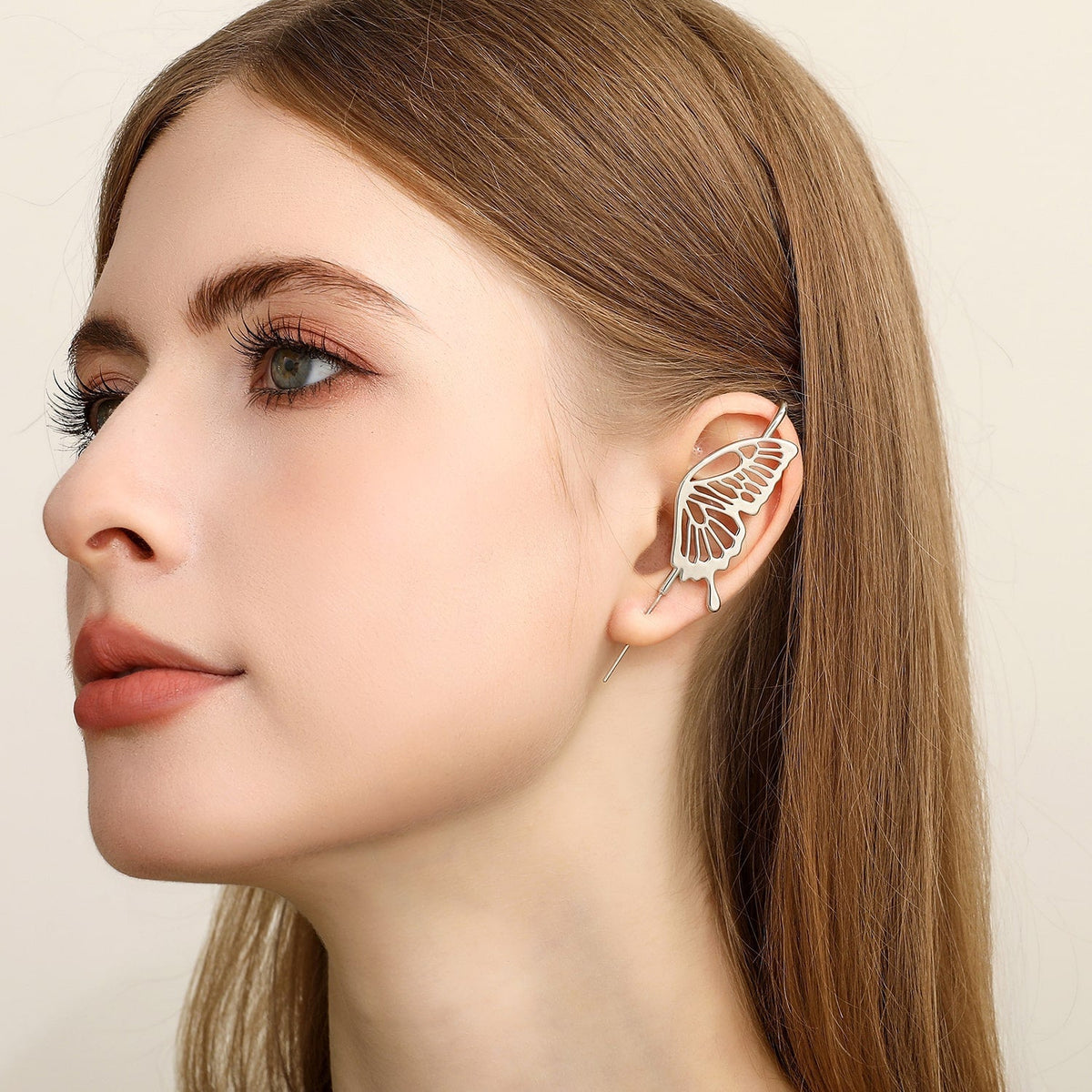 Gentle Butterfly ear cuff worn on the ear, profile view