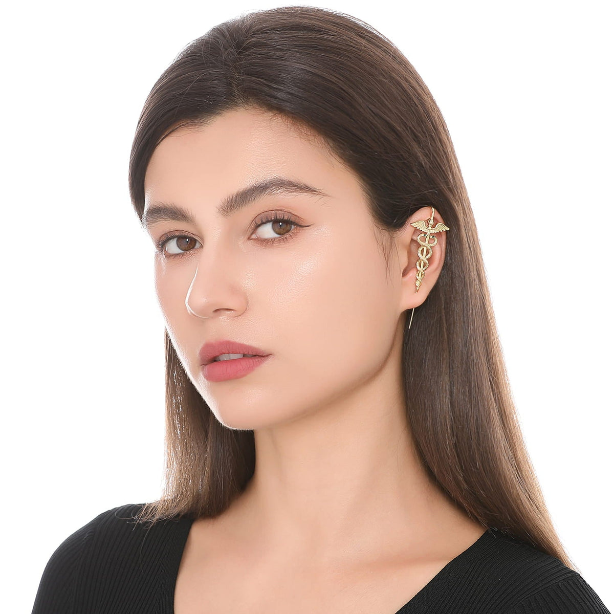 Caduceus ear cuff worn on the ear, profile view
