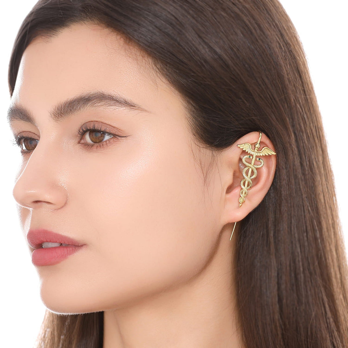 Caduceus ear cuff worn on the ear, profile view