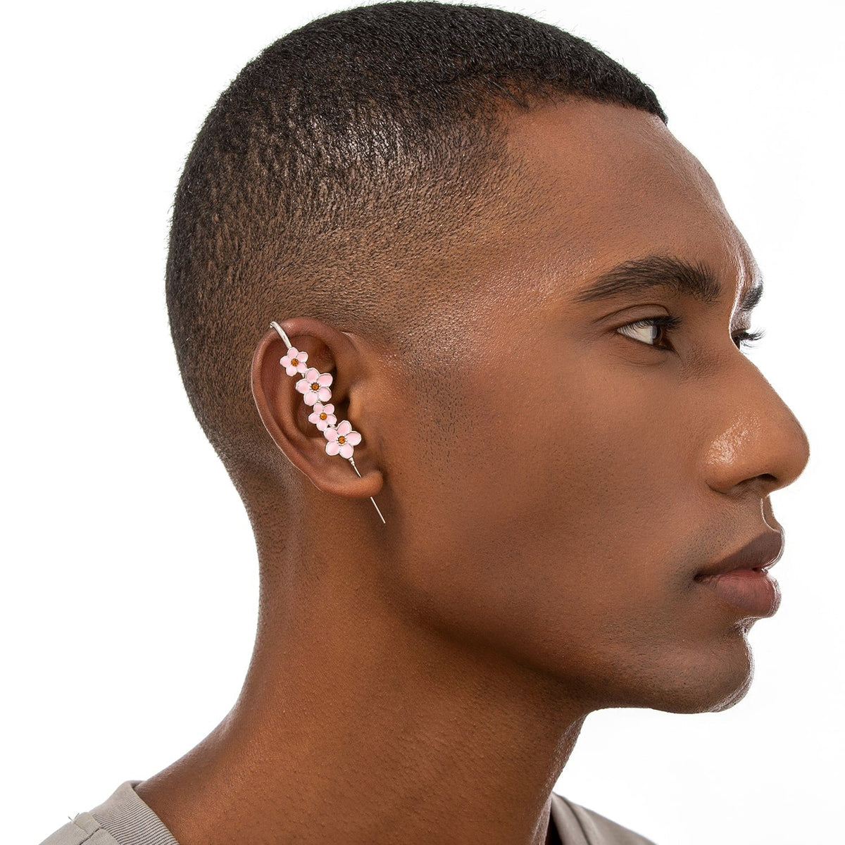 Cherry Blossom ear cuff worn on the ear, profile view