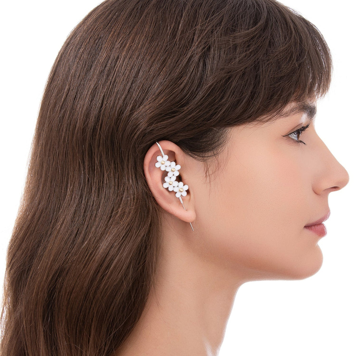 Daisy Flower ear cuff worn on the ear, profile view
