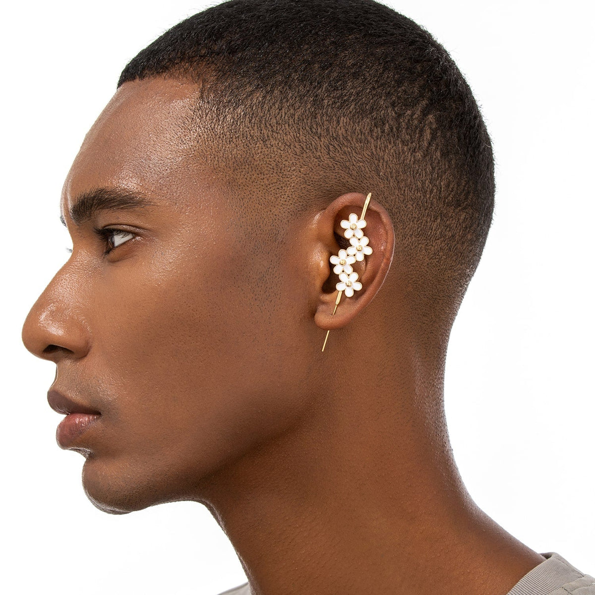 Daisy Flower ear cuff worn on the ear, profile view