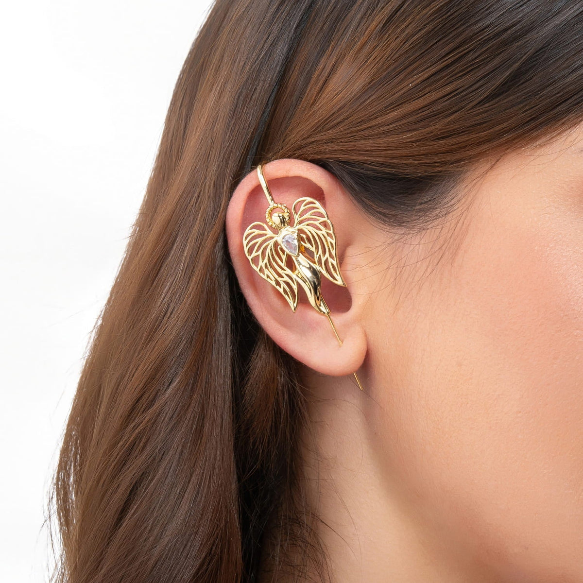 Guardian Angel ear cuff in gold on a black ear form