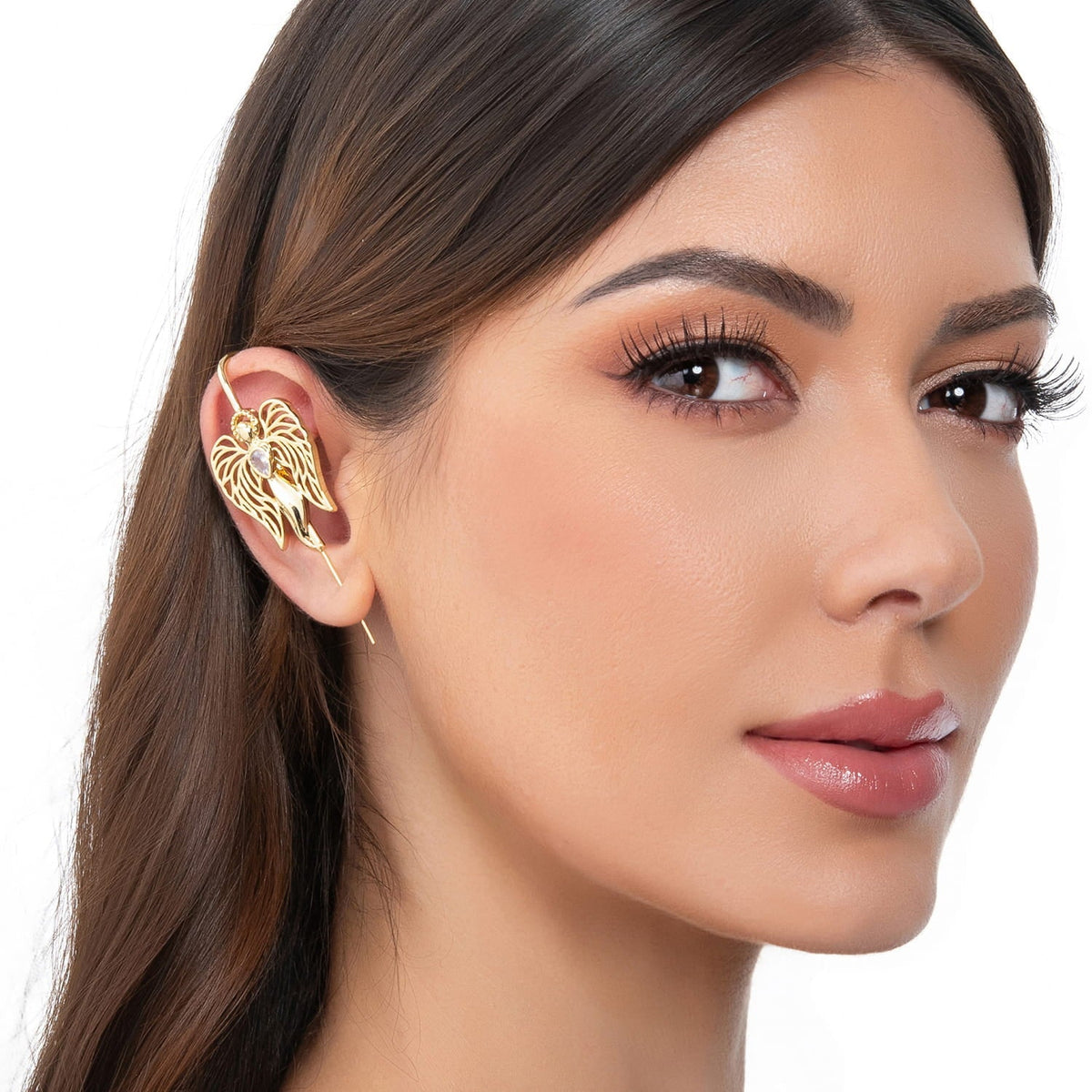 Guardian Angel ear cuff in gold on a black ear form