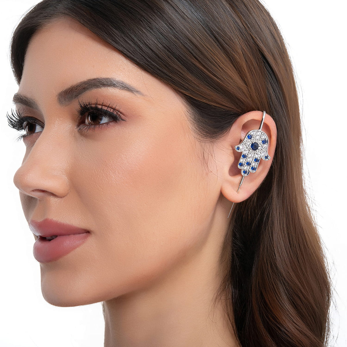 Hamsa ear cuff in silver on a black ear form