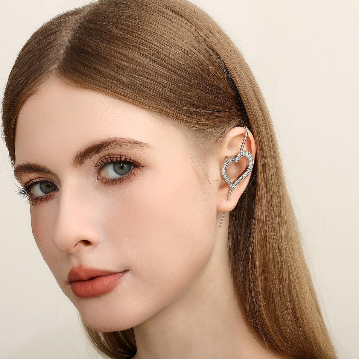 Pure Heart ear cuff worn on the ear, profile view