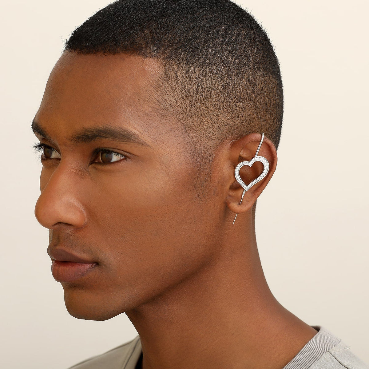 Pure Heart ear cuff worn on the ear, profile view