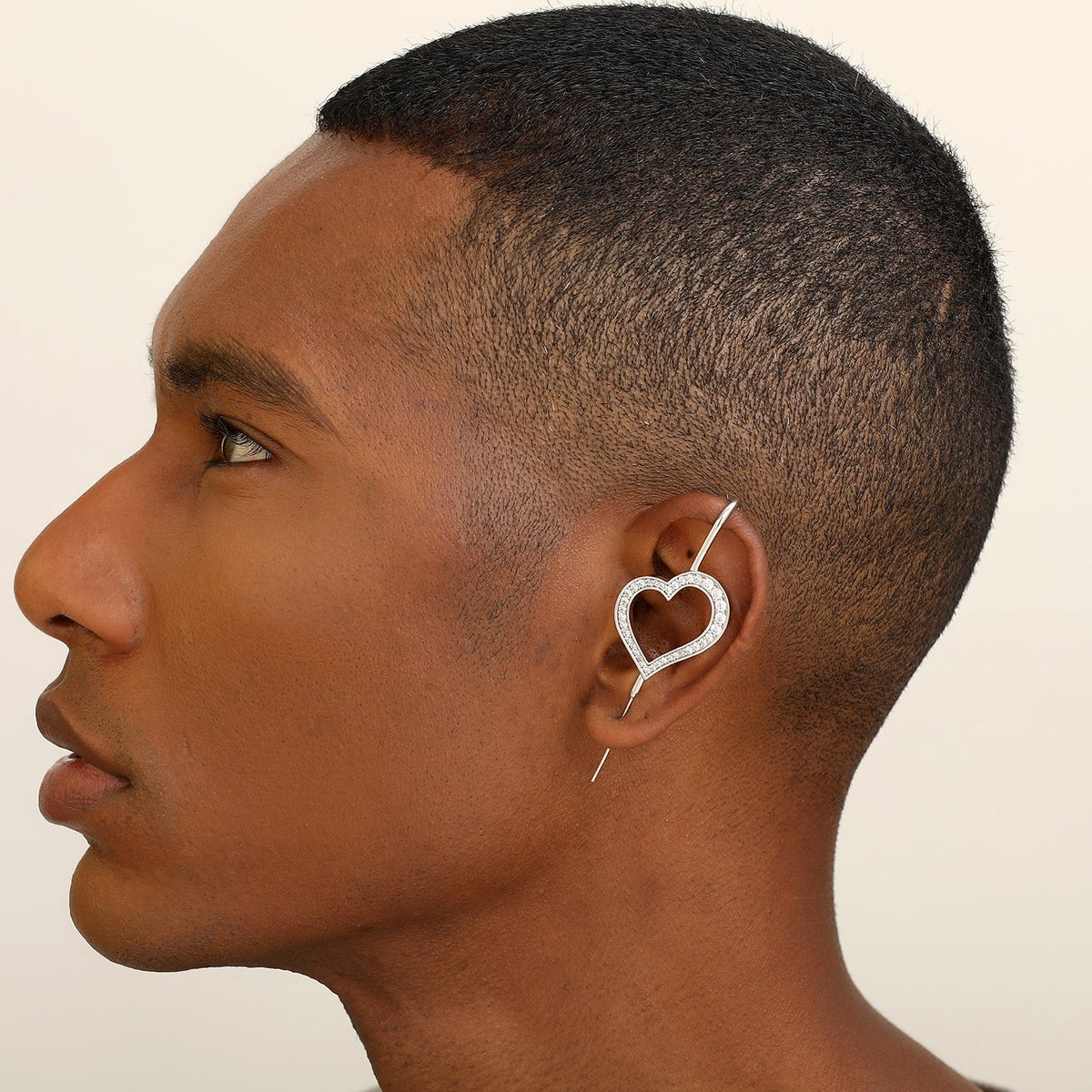 Pure Heart ear cuff worn on the ear, profile view