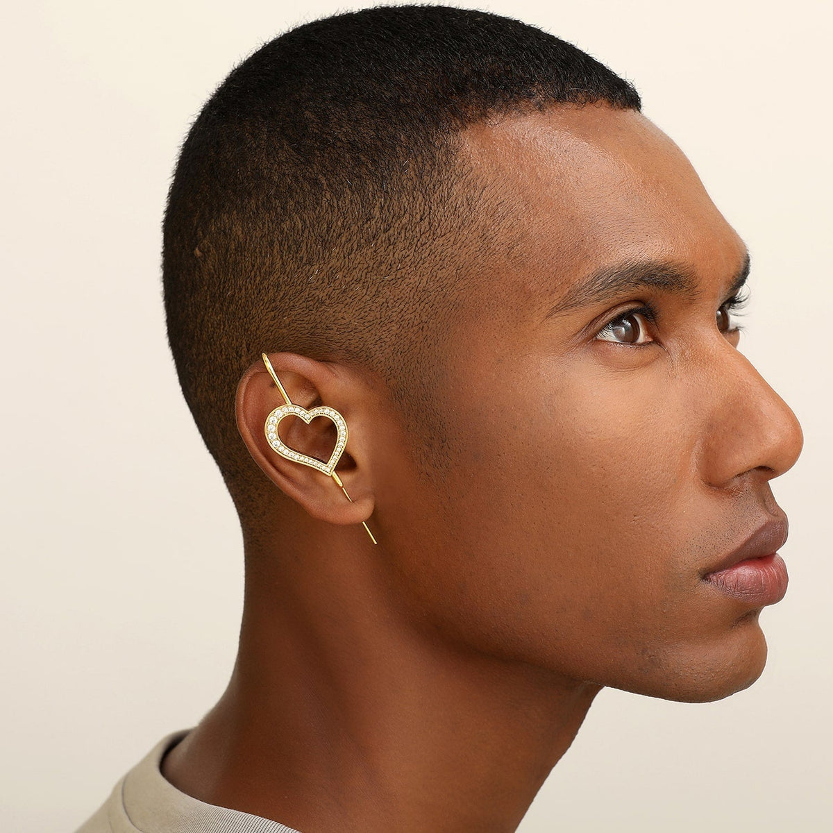 Pure Heart ear cuff worn on the ear, profile view