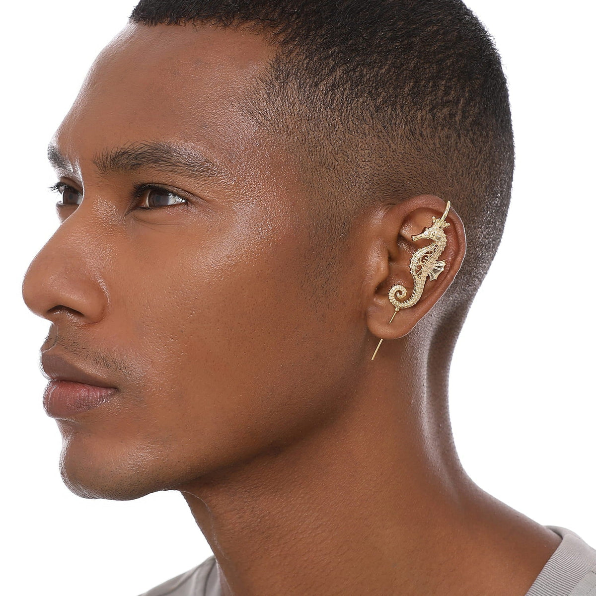 Imperial Seahorse ear cuff worn on the ear, profile view