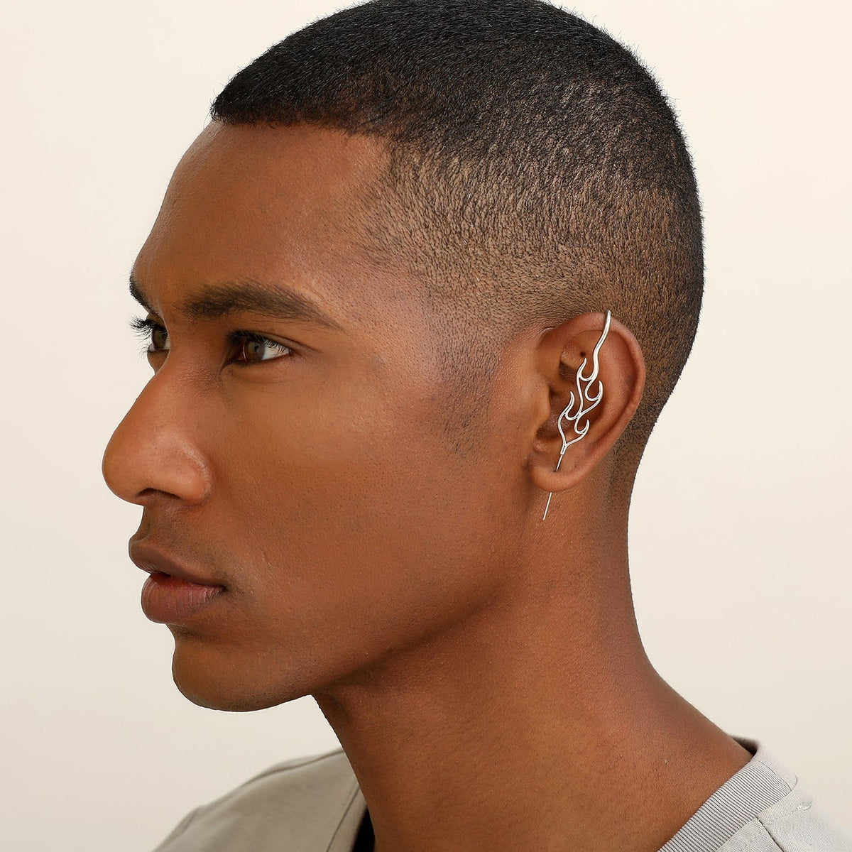 Inner Fire ear cuff worn on the ear, profile view