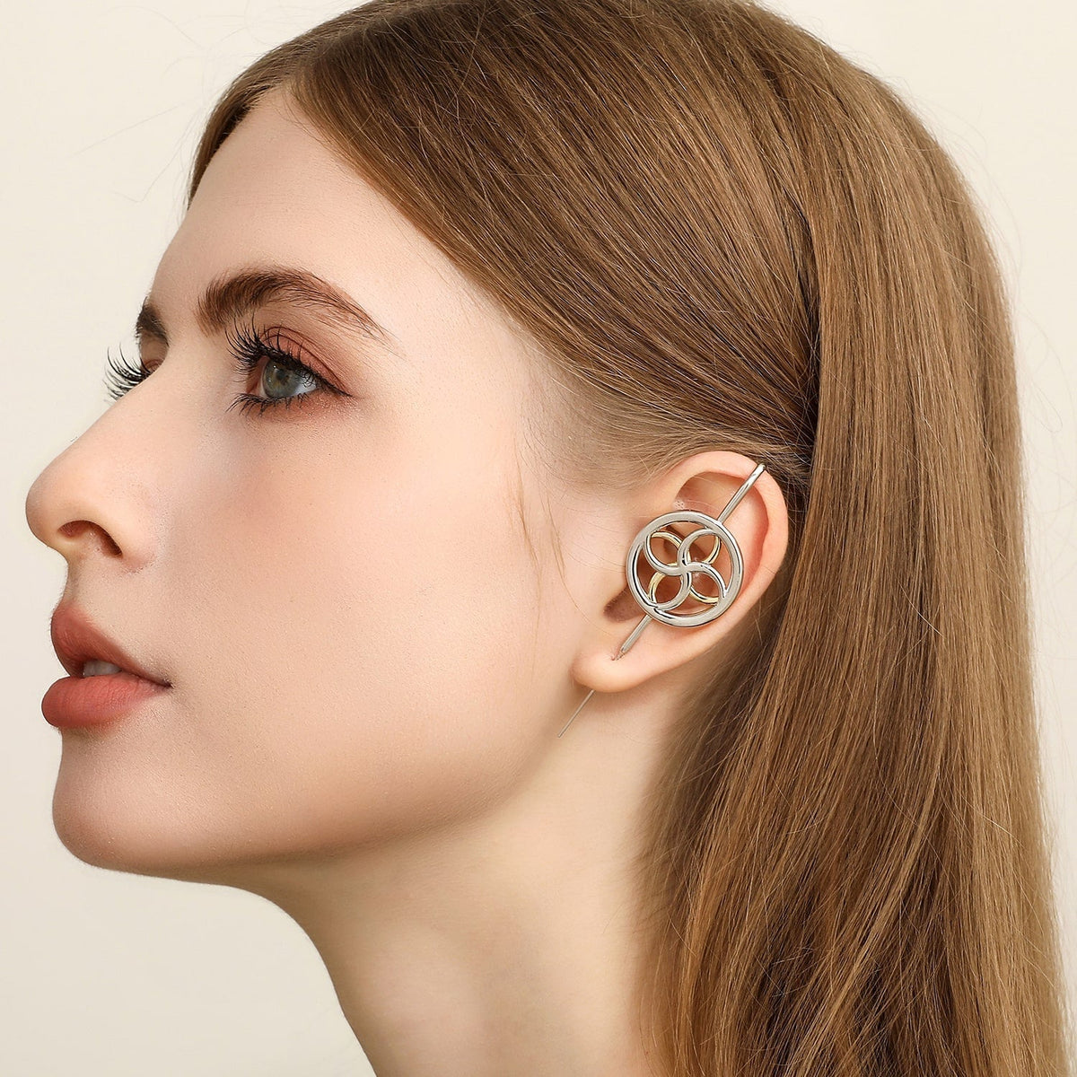 Kinetic Loop ear cuff worn on the ear, profile view