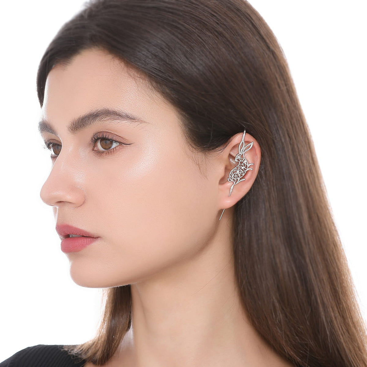 Leaping Hare ear cuff worn on the ear, profile view