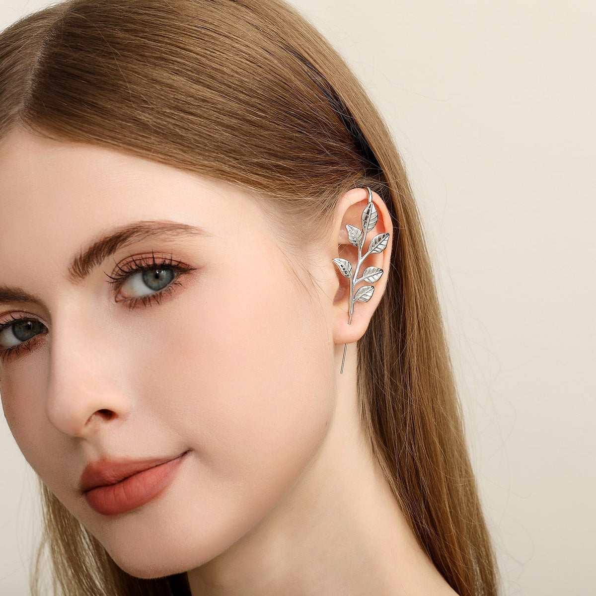 Whispering Leaves ear cuff worn on the ear, profile view