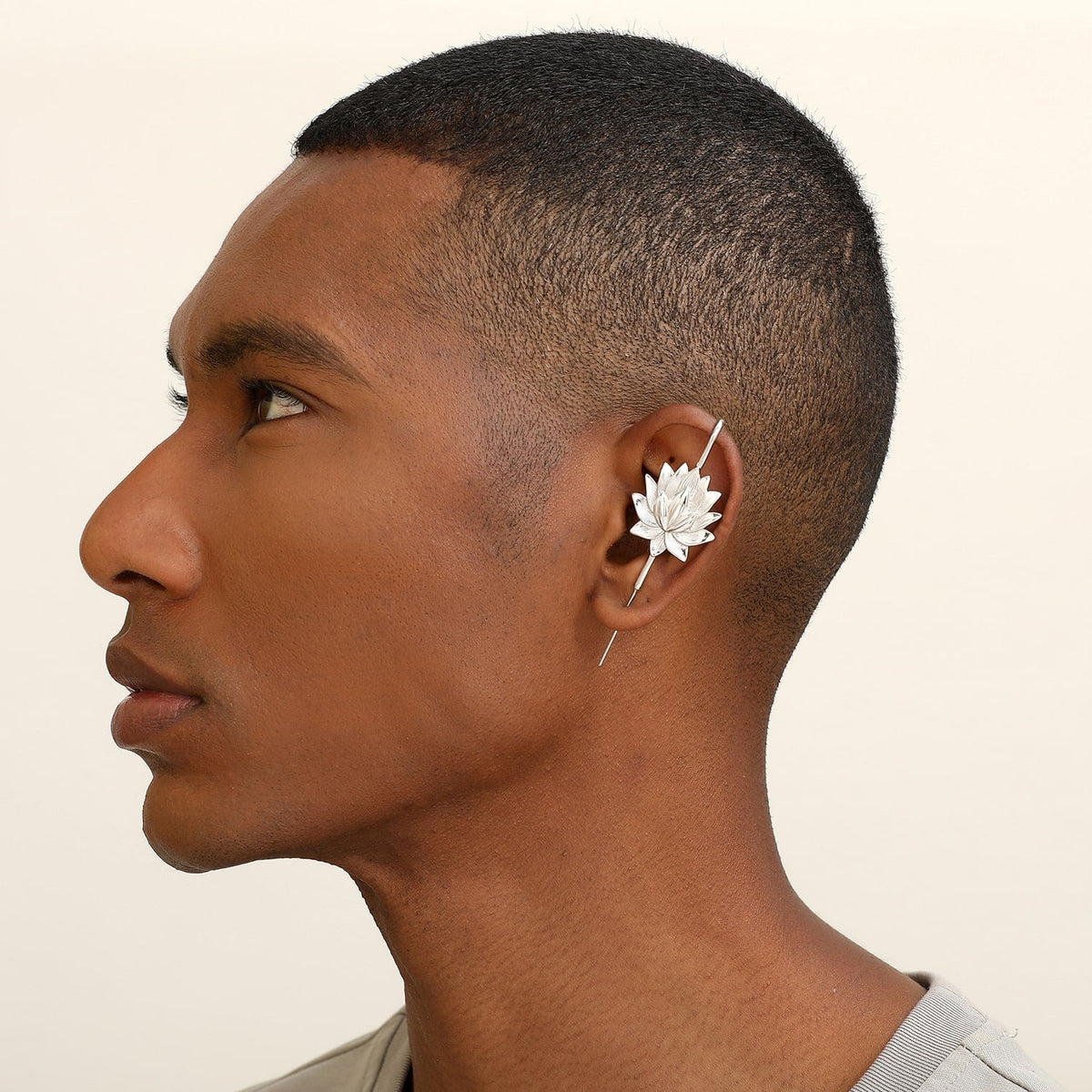 Lotus Bloom ear cuff worn on the ear, profile view