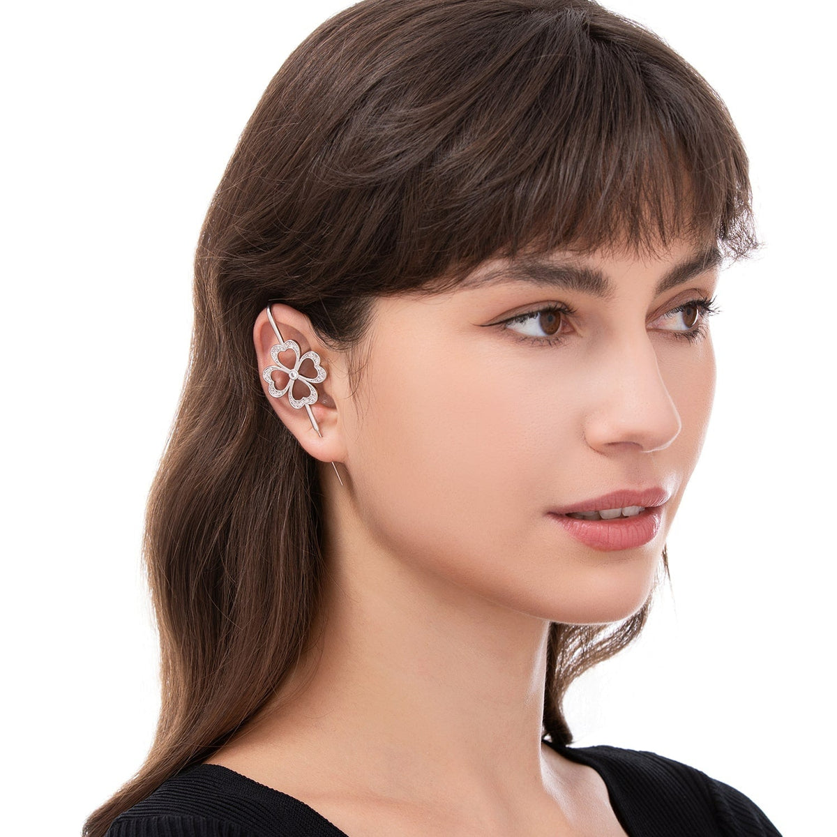 Lucky Clover ear cuff worn on the ear, profile view