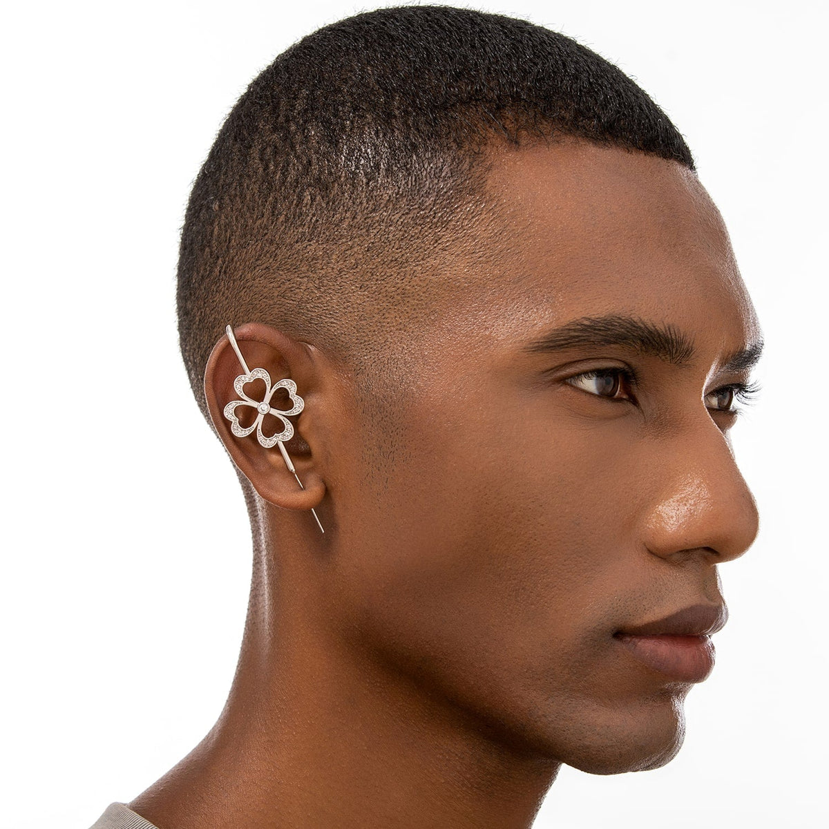 Lucky Clover ear cuff worn on the ear, profile view