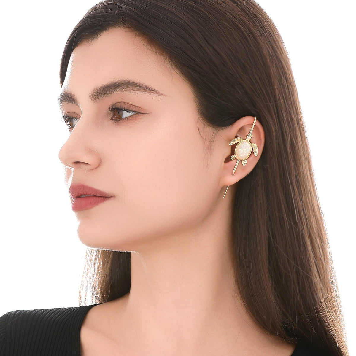 Ocean Guardian ear cuff worn on the ear, profile view