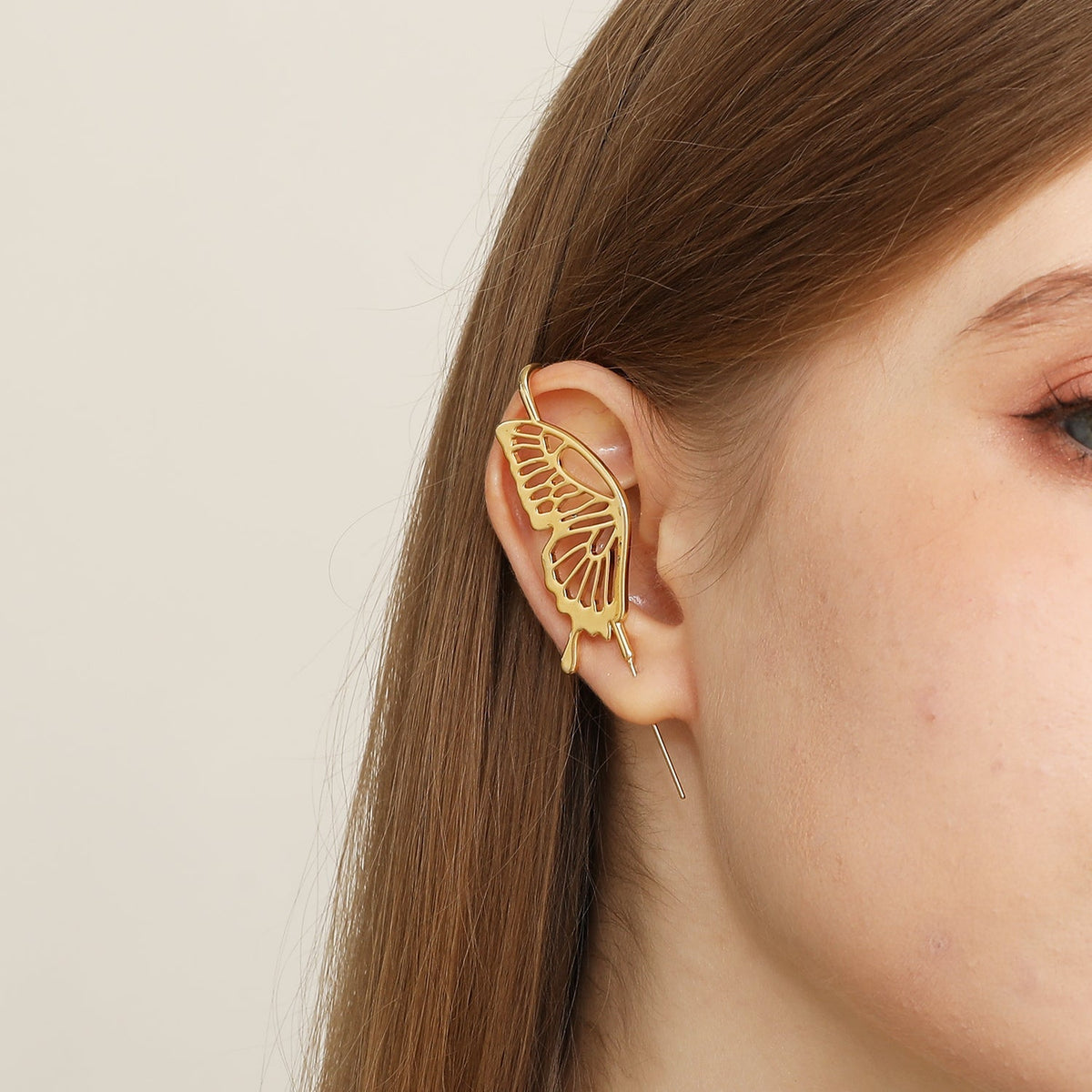Gentle Butterfly ear cuff worn on the ear, profile view