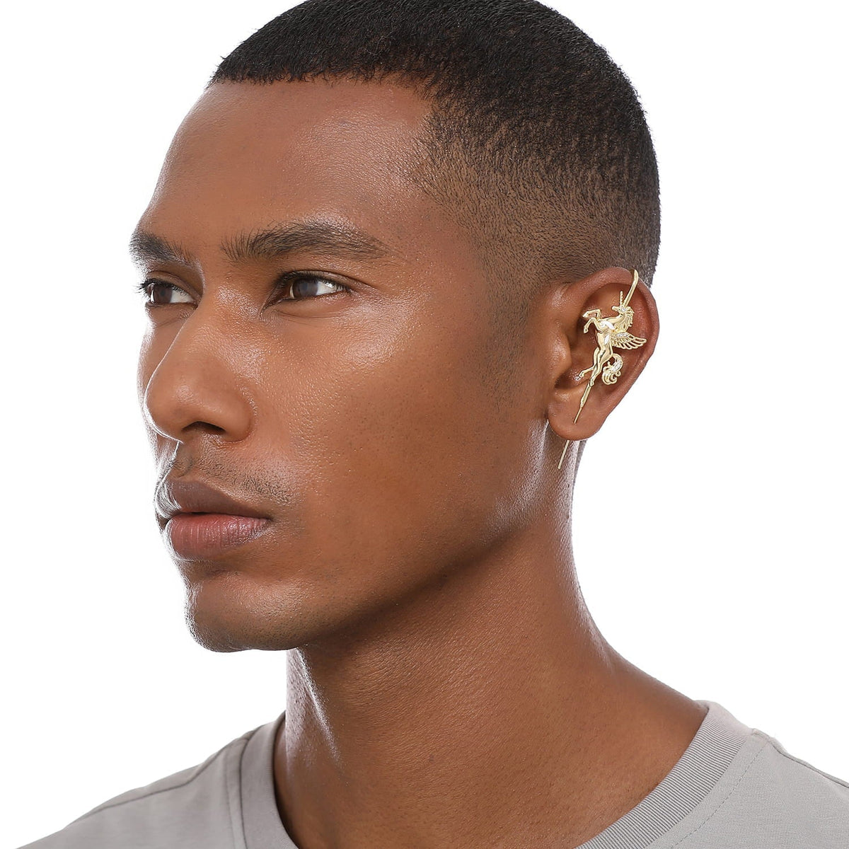 Pegacorn ear cuff worn on the ear, profile view