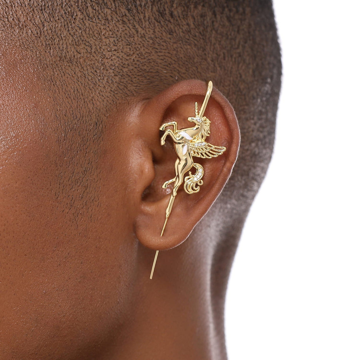 Pegacorn ear cuff worn on the ear, profile view