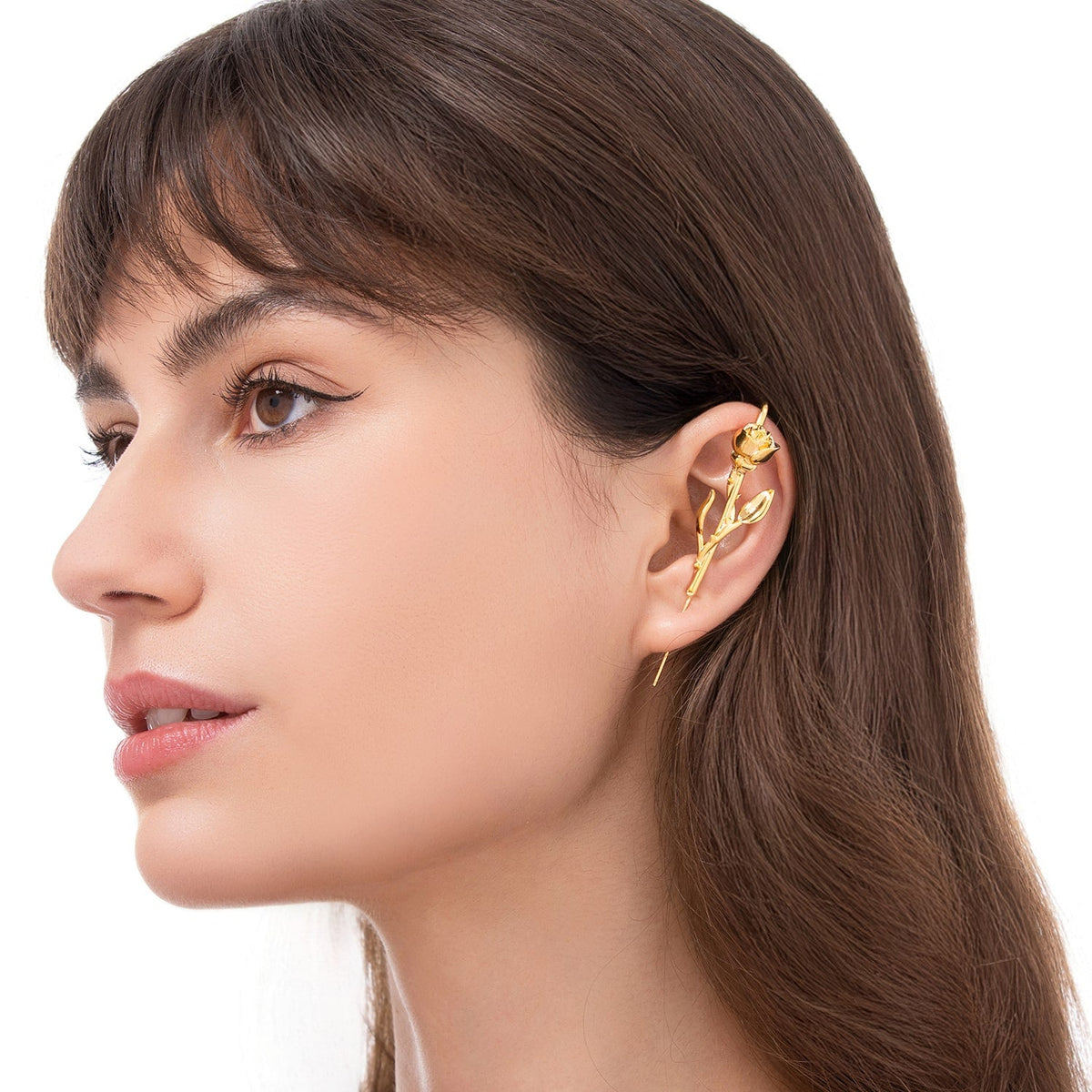 Radiant Rose ear cuff worn on the ear, profile view