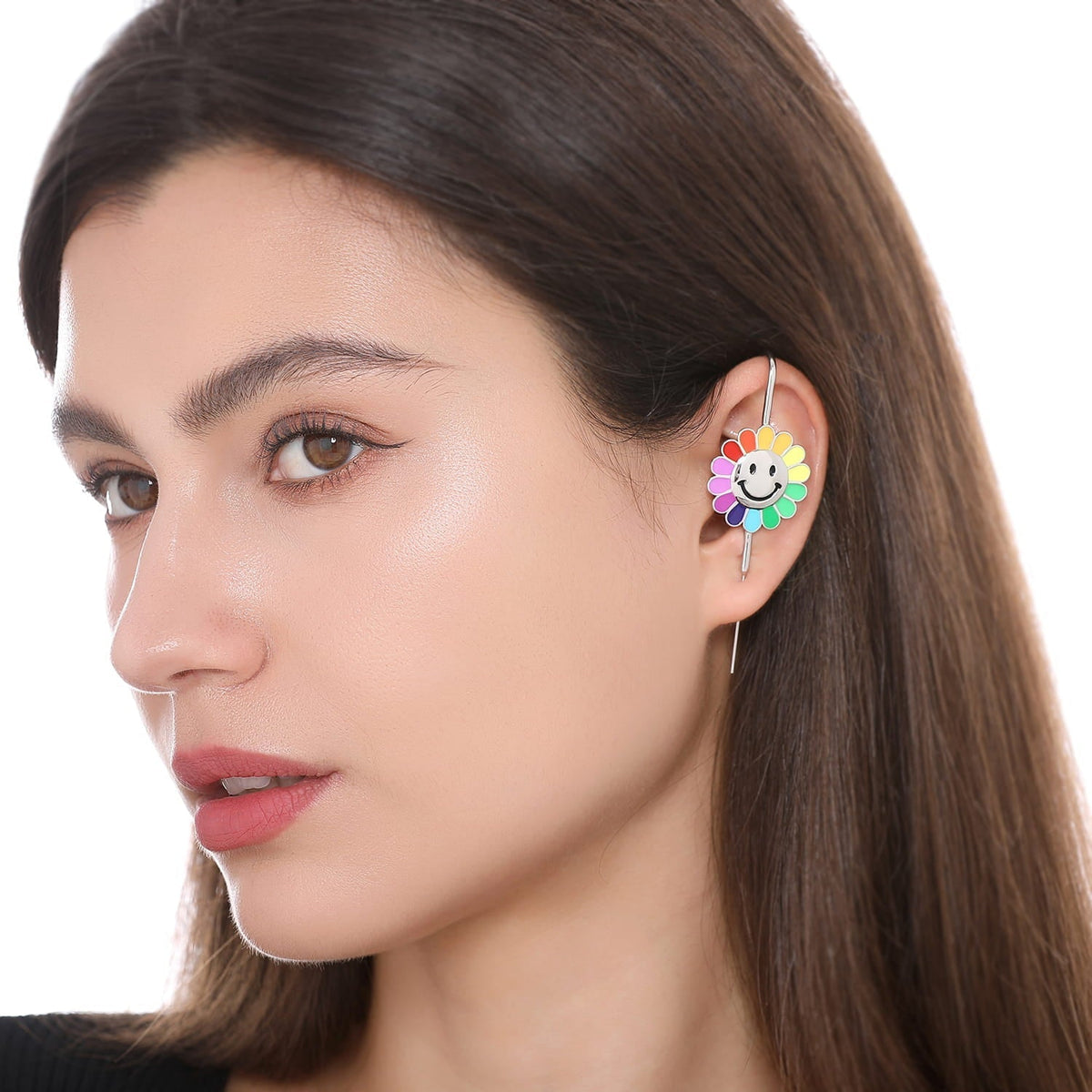Rainbow Flower ear cuff worn on the ear, profile view