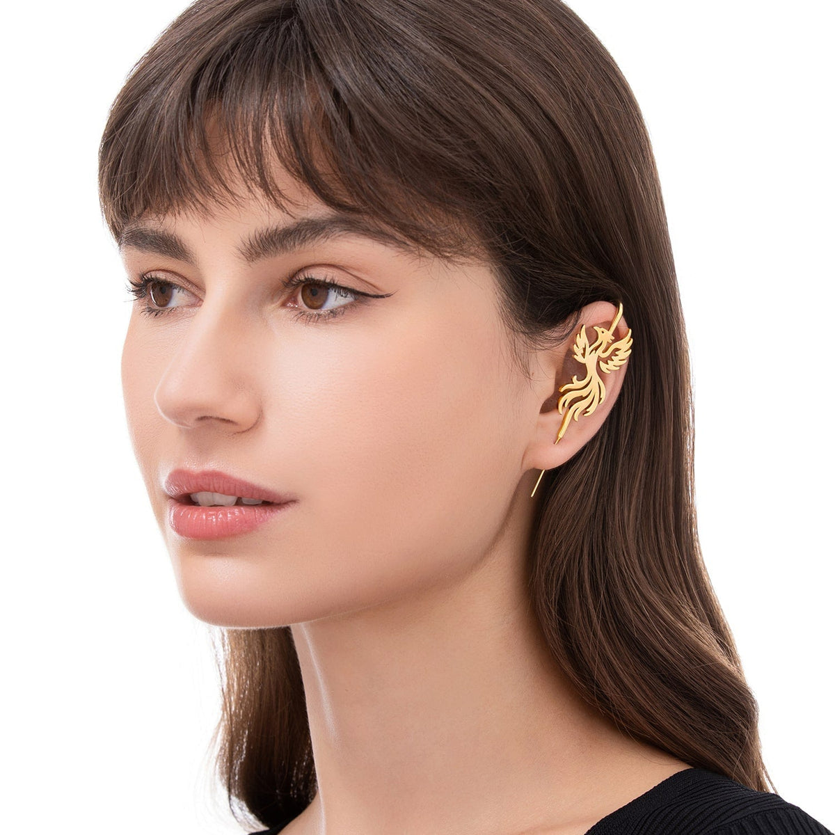 Rising Phoenix ear cuff worn on the ear, profile view