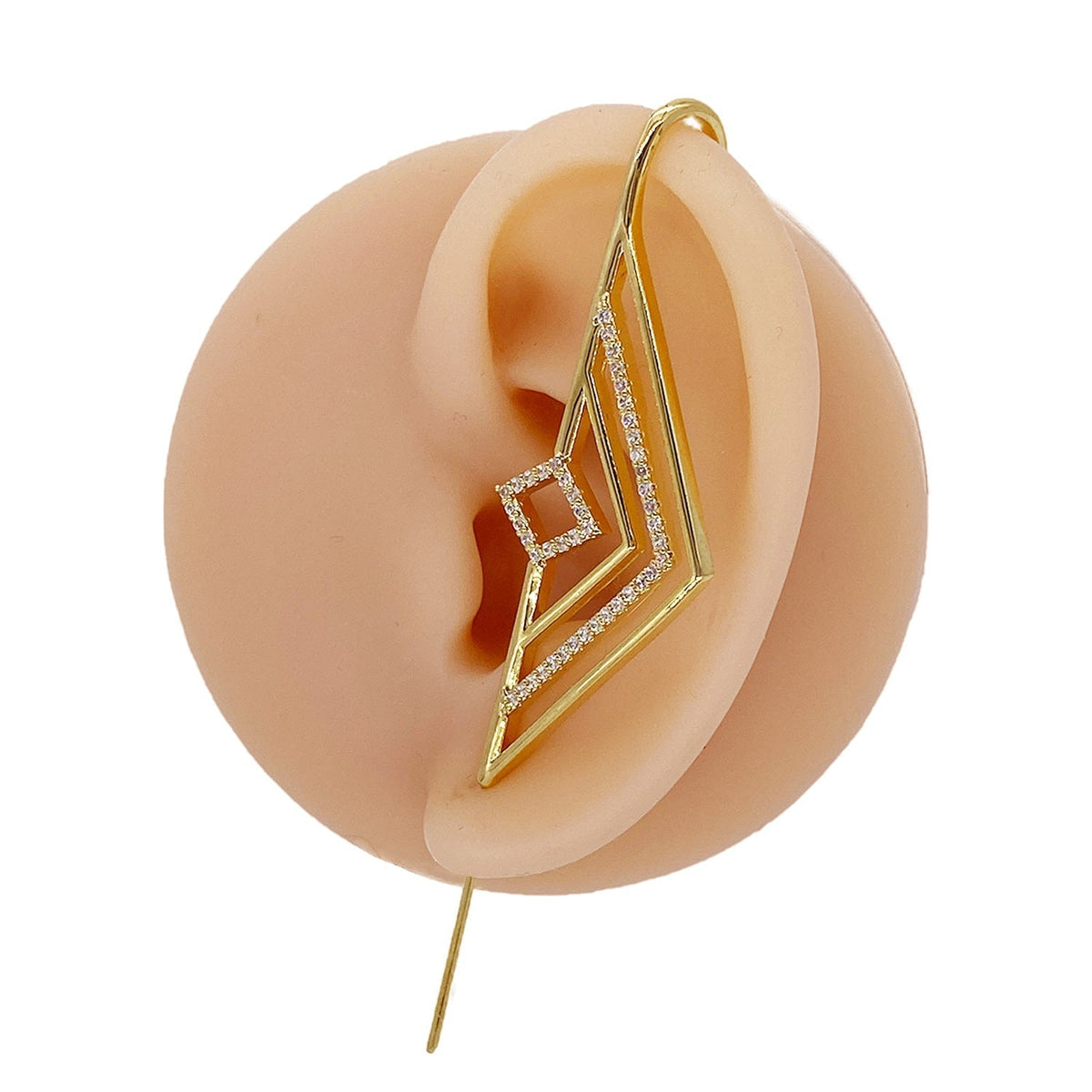 Ascension ear cuff in gold on a black ear form
