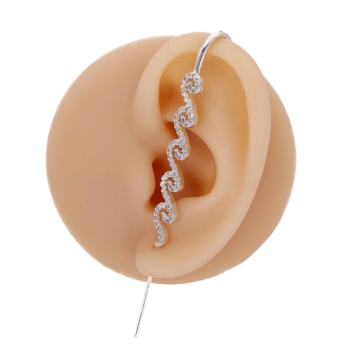 Ocean Waves ear cuff in silver on a black ear form