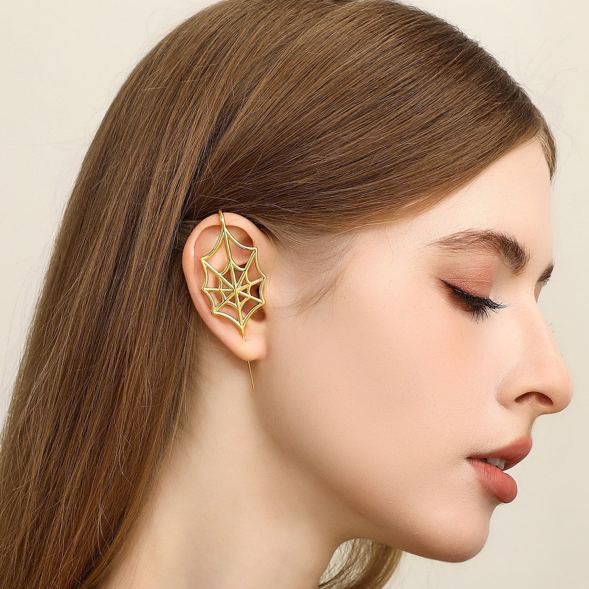 Silky Web ear cuff worn on the ear, profile view