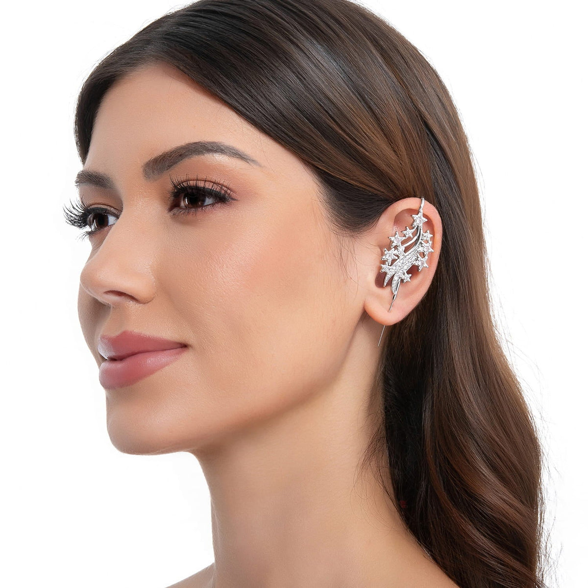 Starfall ear cuff in silver on a black ear form