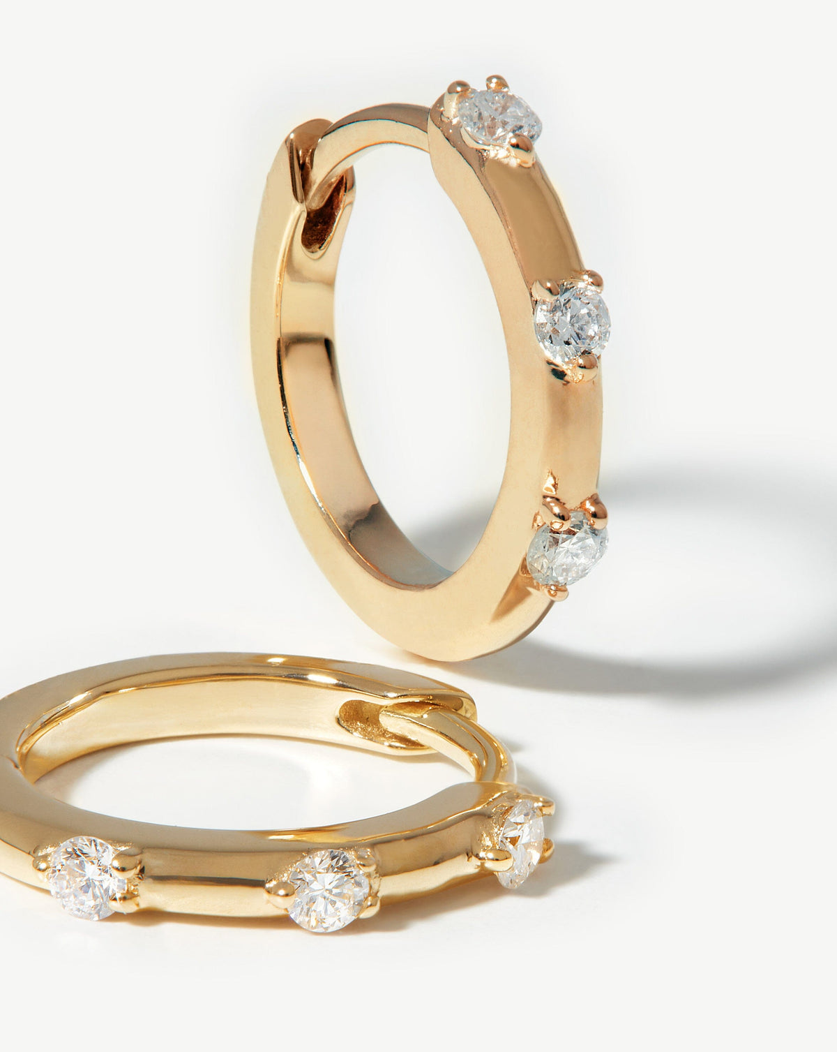 Avaline Solid Gold Diamond Studded Huggies
