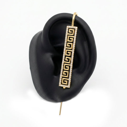 Tribal ear cuff in gold on a black ear form